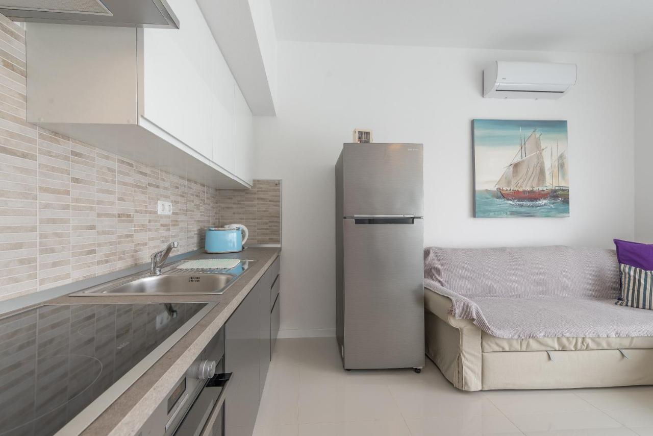 Windrose Apartments Vir Bagian luar foto